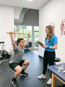 Athlete receiving one-on-one physical therapy treatment and performance assessment in Farmingdale