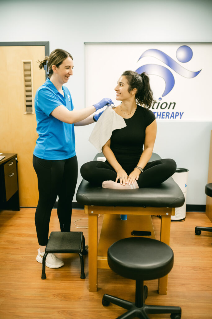 Sports physical therapist treating a patient in farmingdale, NY